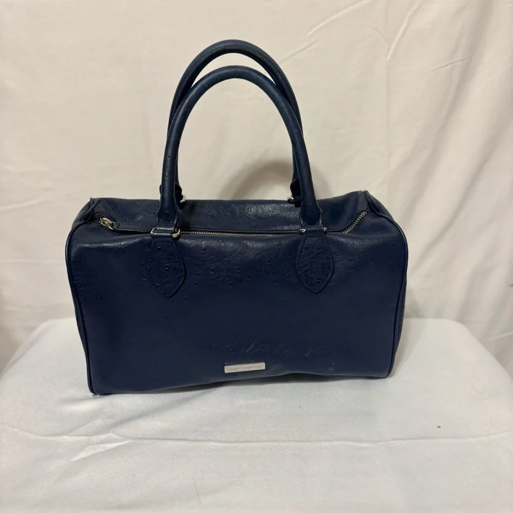 Brooks Brothers navy blue barrel bag satchel made of embossed pebbled leather